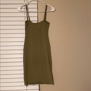 Green spaghetti strapped dress.